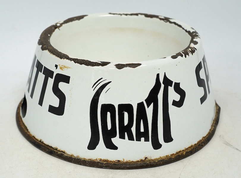 A vintage Spratt’s circular enamel advertising dog bowl, 27cm diameter, 10cm high. Condition - poor